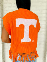 Load image into Gallery viewer, Back view of UT power T on Queen of Sparkles orange fringe sweater vest with 'go vols' text on the front, paired with denim shorts.