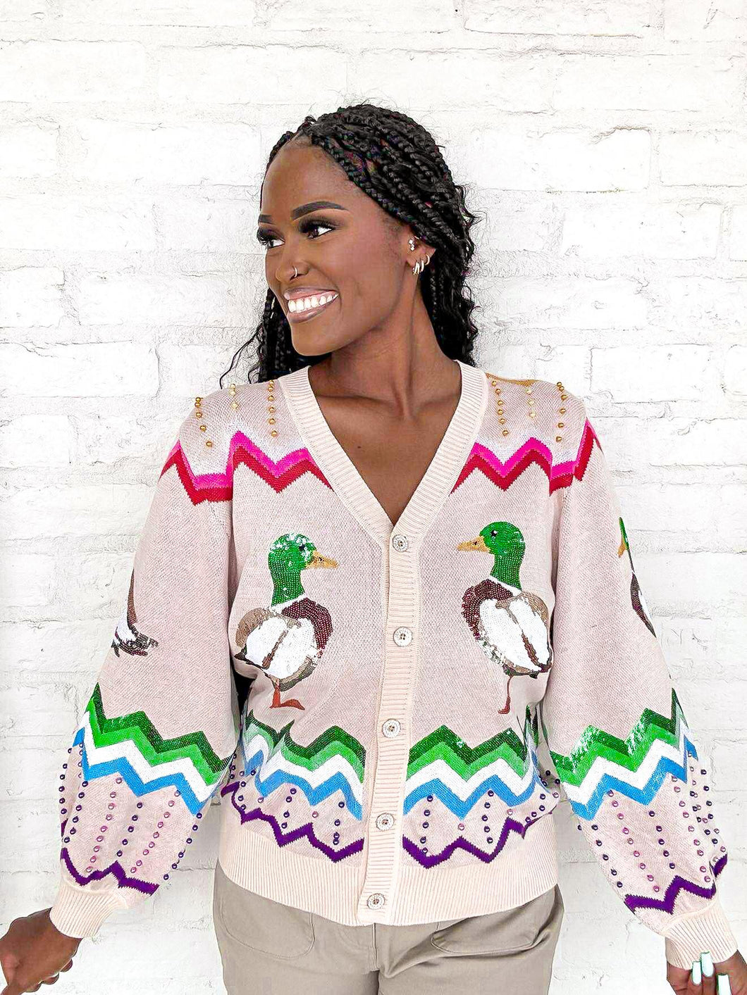 Queen Of Sparkles Multi Zig Zag Duck Cardigan light beige pink with colorful geometric stripes and sequin mallard ducks
