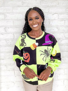 Queen Of Sparkles Green And Black Checkered Icon Sweatshirt with purple sequin witches hat, orange pumpkin, sequin spiderweb and candy corn