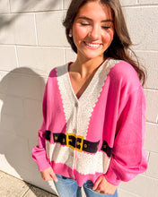 Load image into Gallery viewer, Pink Santa cardigan by Queen of Sparkles with glitter trim and belt, styled with jeans
