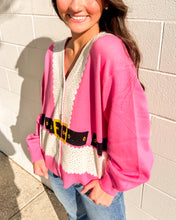Load image into Gallery viewer, Pink Santa cardigan by Queen of Sparkles with glitter trim and belt, styled with jeans